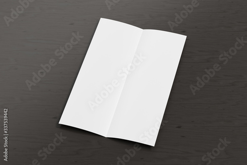 Blank vertical A4 leaflet on black wooden background. Bi-fold or half-fold opened brochure isolated with clipping path. Side view. 3d illustration © dimamoroz