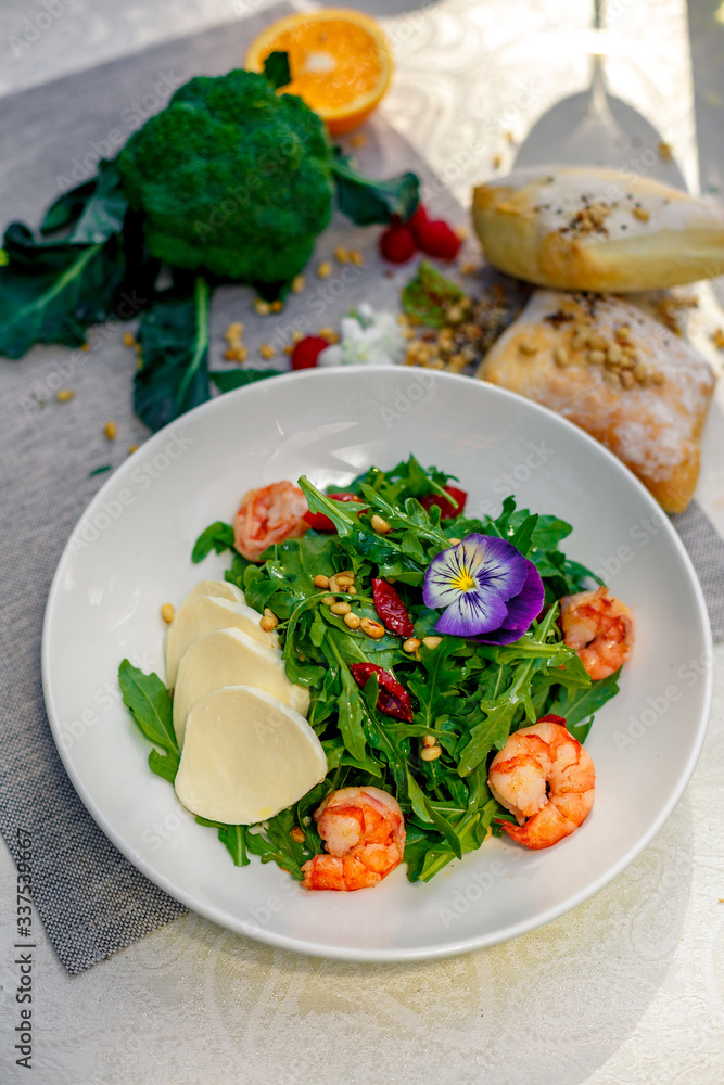 fresh salad with dried meat greens and vegetables on the table, healthy food fresh salad with dried meat greens and vegetables on the table, healthy food