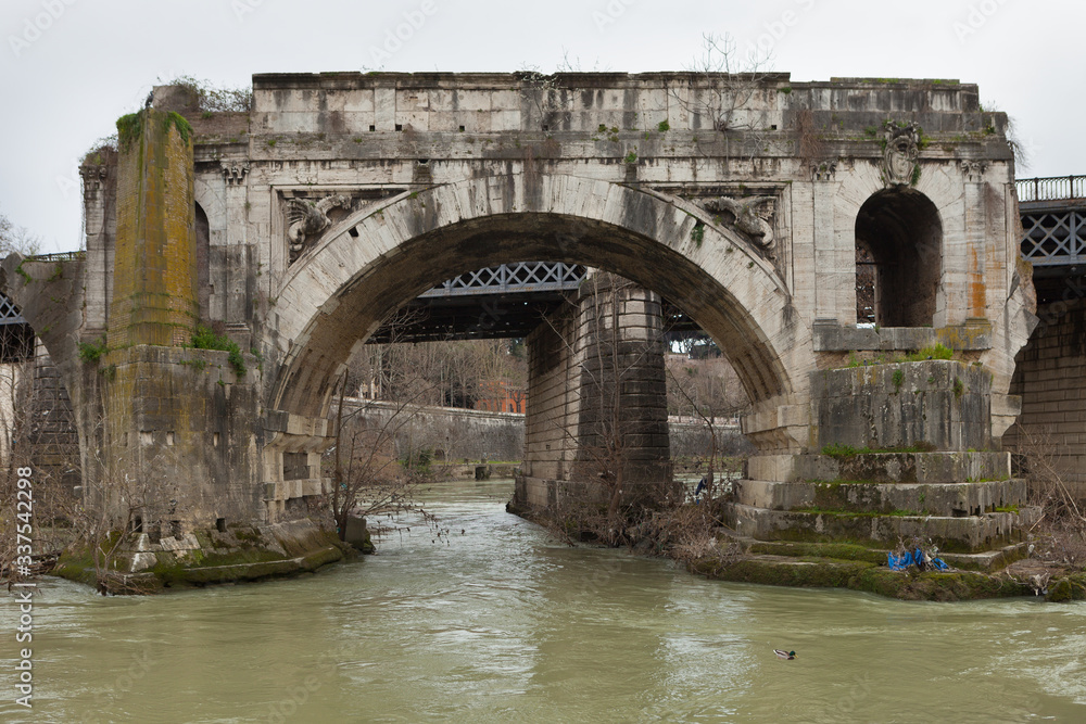 The Pons Aemilius (Ponte Emilio or Ponte Rotto). Oldest Roman stone bridge in Rome, Italy. View from Tiber Island