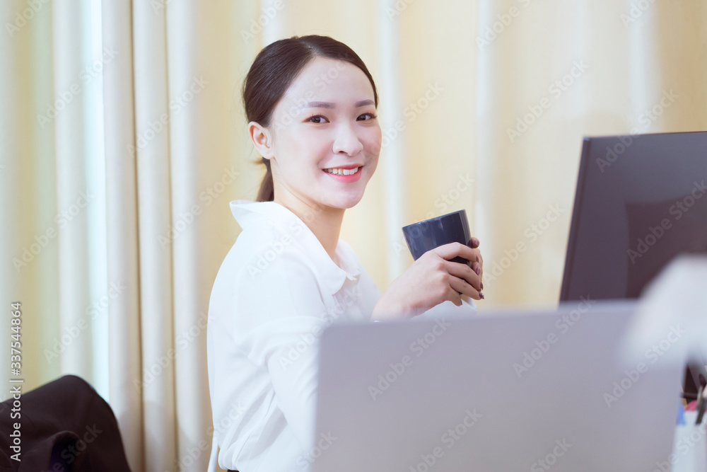 A business woman working in office