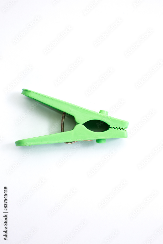 Green clothespins set. Isolated on white. Green clothespins set. Isolated on white.