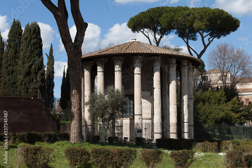 The Temple of Hercules Victor (Hercules the Winner) (Tempio di Ercole Vincitore) or Hercules Olivarius. Roman round temple in Piazza Bocca della Verita, in the area of the Forum Boarium. Rome, Italy photo