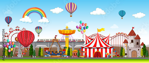 Themepark scene with many rides at day time