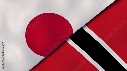 The flags of Japan and Trinidad and Tobago. News, reportage, business background. 3d illustration