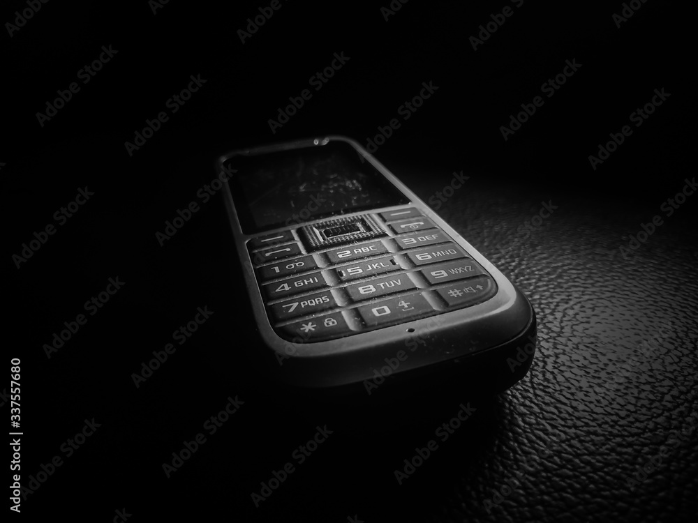 black and white photo of a dusty old model phone black and white photo of a dusty old model phone