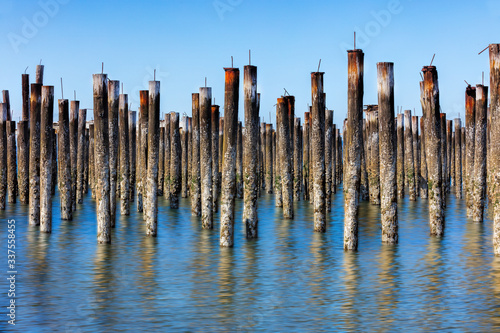 Rows or pier posts in the ocean