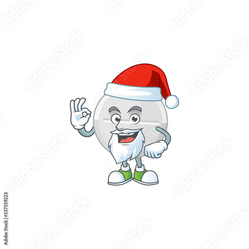 Friendly white pills Santa cartoon character design with ok finger © kongvector