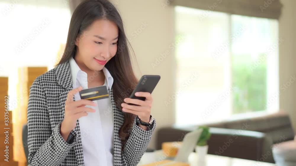Woman Entering Credit Card Details for Online Payment on Smartphone. Woman Entering Credit Card Details for Online Payment on Smartphone.