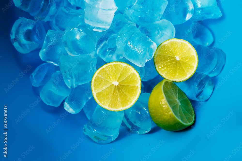 lemon and ice on a blue background for the background lemon and ice on a blue background for the background