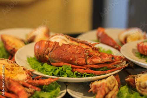 Seafood plate with lobster in a Vietnamese restaurant.