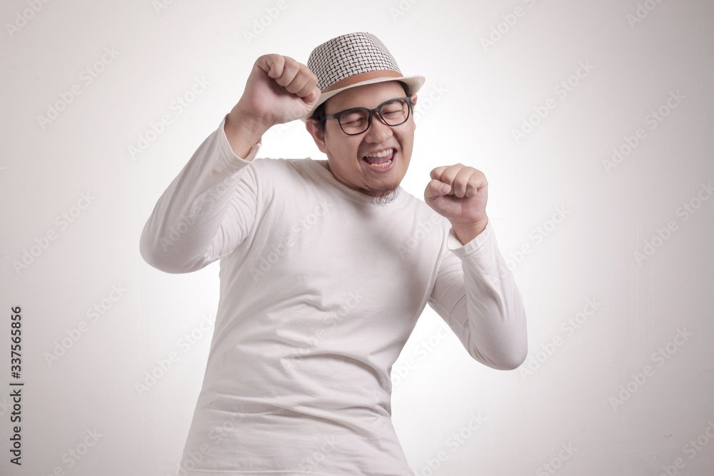 Happy Funny Asian Man Dancing Full of Joy, Winning Happy Funny Asian Man Dancing Full of Joy, Winning