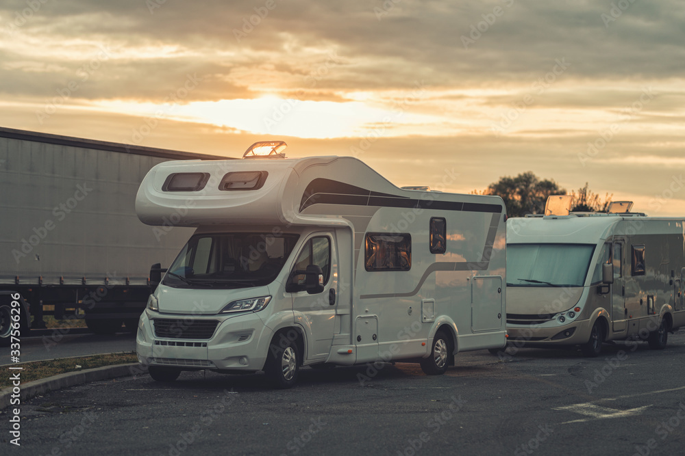 sunrise with campervan mobile home campervan fuels in gas station for an outdoor nomad lifestyle camper van caravan vehicle for van life holiday on motor home journey camping in the parking