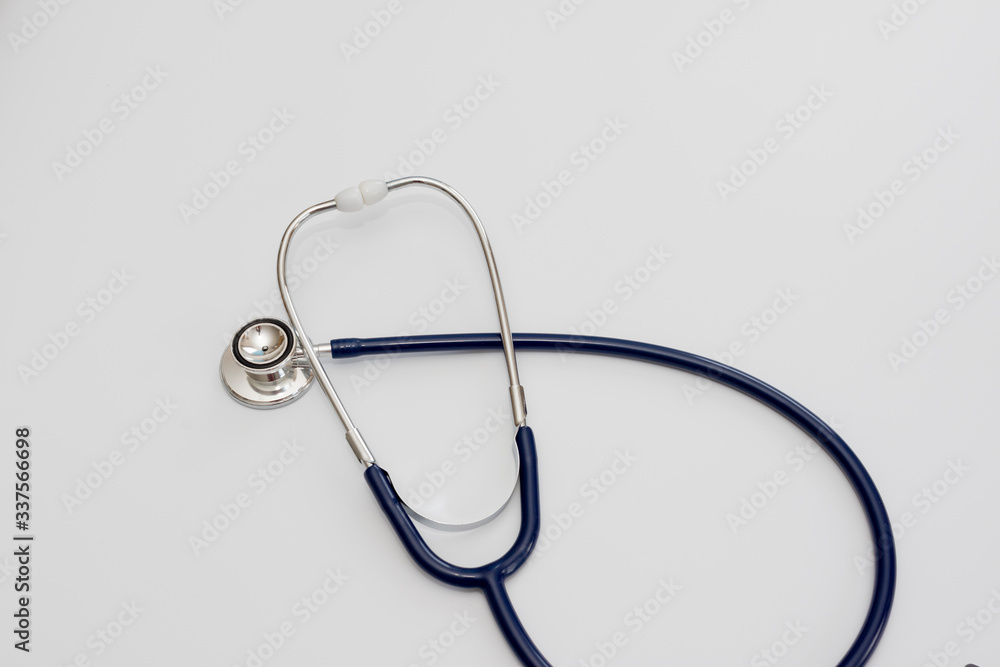 Stethoscope isolated on white, top view. Medical tool Stethoscope isolated on white, top view. Medical tool