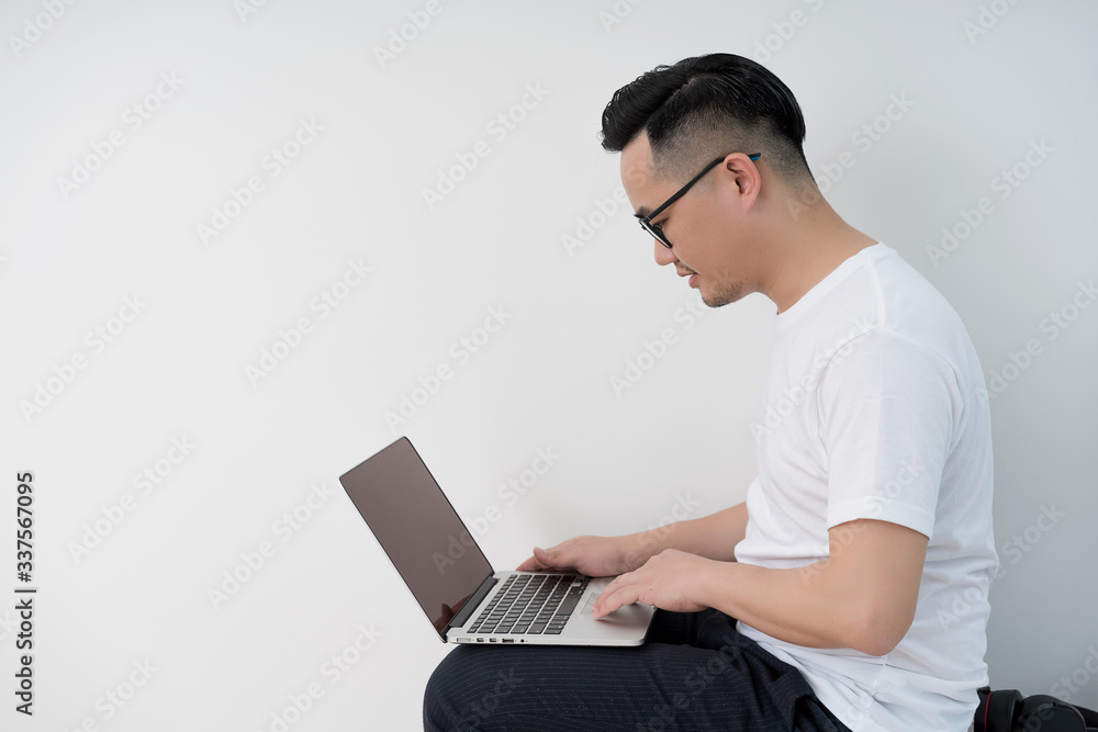 Home office scene of young Asian men Home office scene of young Asian men