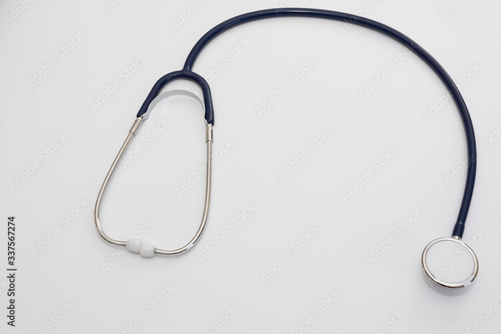 Stethoscope isolated on white, top view. Medical tool Stethoscope isolated on white, top view. Medical tool