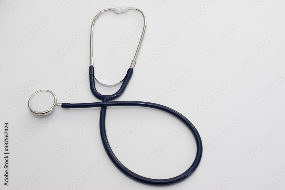 Stethoscope isolated on white, top view. Medical tool Stethoscope isolated on white, top view. Medical tool