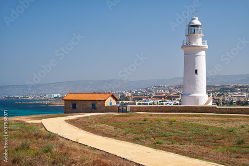 Yellow road going to the Paphos lighthouse. Cyprus