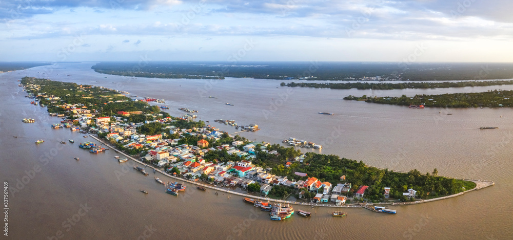 Panorama, Aerial view of Tan Long island or Con Tan Long in Tien Giang, Vietnam. Near My Tho city. Mekong Delta. Near Ben Tre Panorama, Aerial view of Tan Long island or Con Tan Long in Tien Giang, Vietnam. Near My Tho city. Mekong Delta. Near Ben Tre