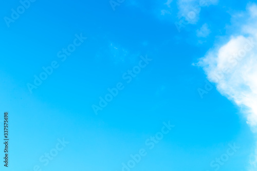 blue sky with beautiful natural white clouds as a background