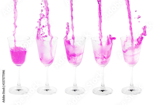 pouring cocktail with splashes isoalted on white background