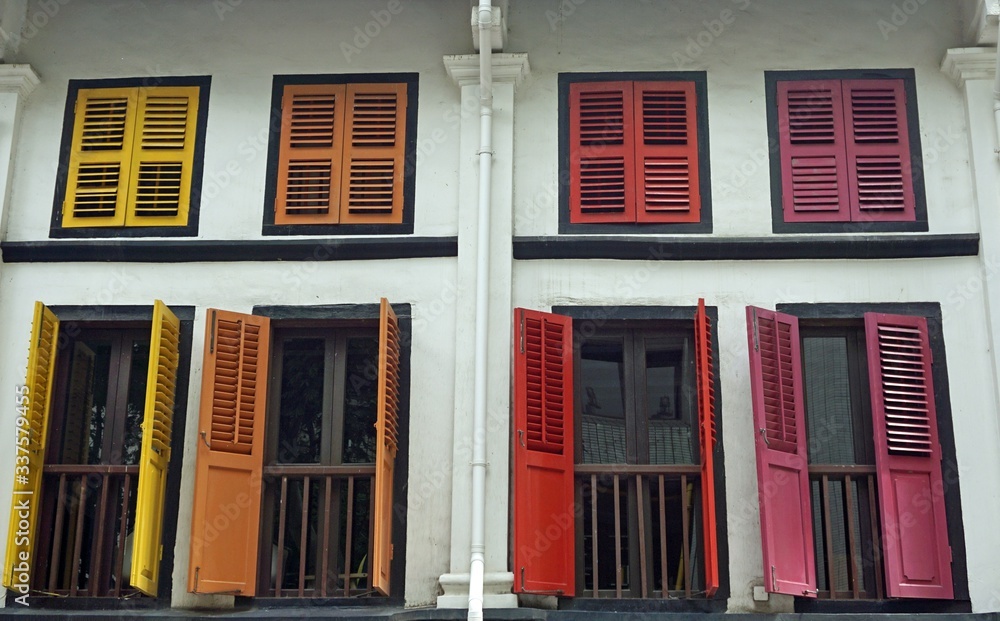 Fototapeta premium colorful wooden window shutters in singapore