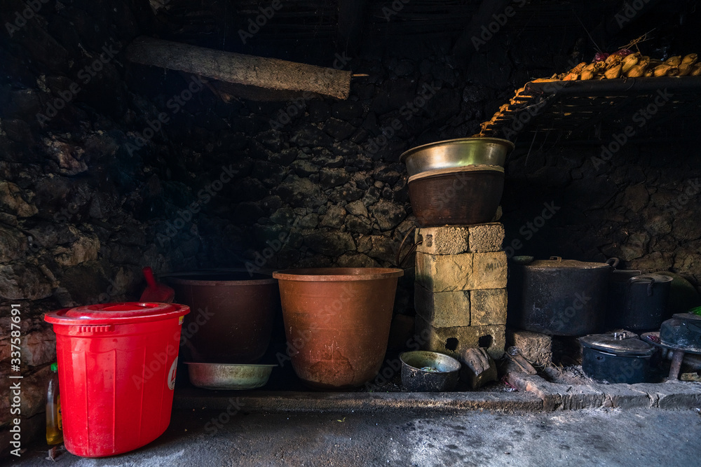 An ancient rock village in Trung Khanh, Cao Bang, Vietnam. Khuoi Ky old village of the Tay ethnic group. Indoor of the house in village An ancient rock village in Trung Khanh, Cao Bang, Vietnam. Khuoi Ky old village of the Tay ethnic group. Indoor of the house in village
