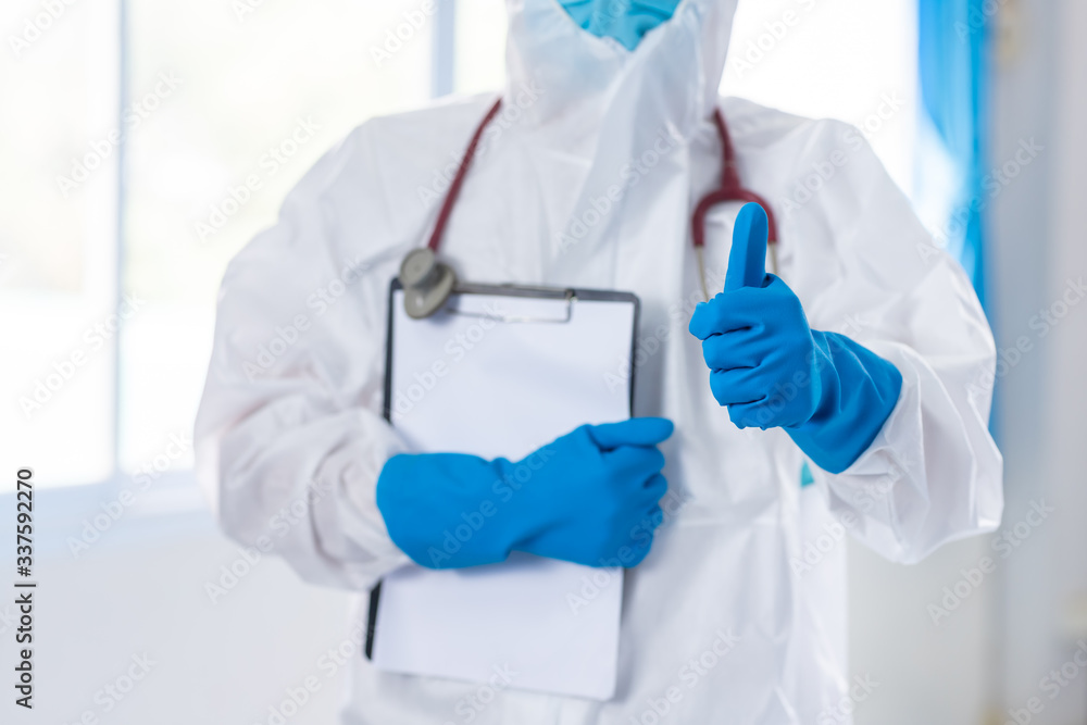 doctor are wearing PPE Thumbs up/Like and hug for corona/covid-19 virus infected patient's laboratory report , healthcare and medical exams concept. doctor are wearing PPE Thumbs up/Like and hug for corona/covid-19 virus infected patient's laboratory report , healthcare and medical exams concept.