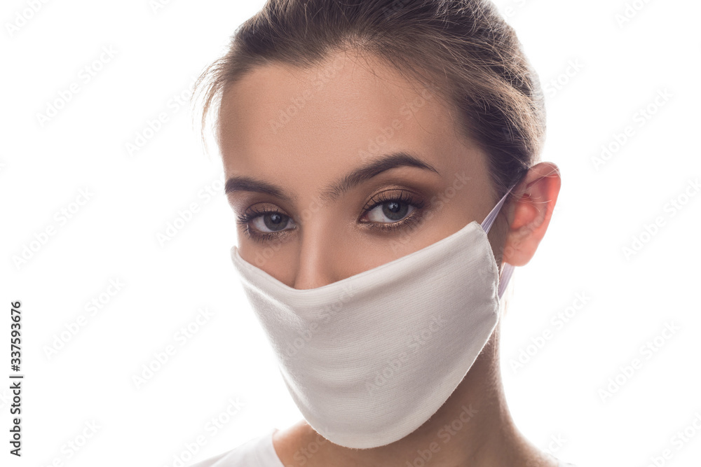 Woman wearing face protective mask on face against Coronavirus. Woman wearing face protective mask on face against Coronavirus.