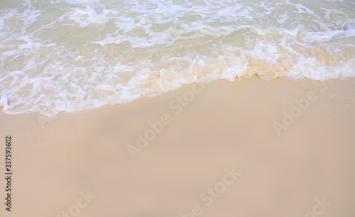 Soft Wave Of Blue Ocean On Sandy Beach. Background.