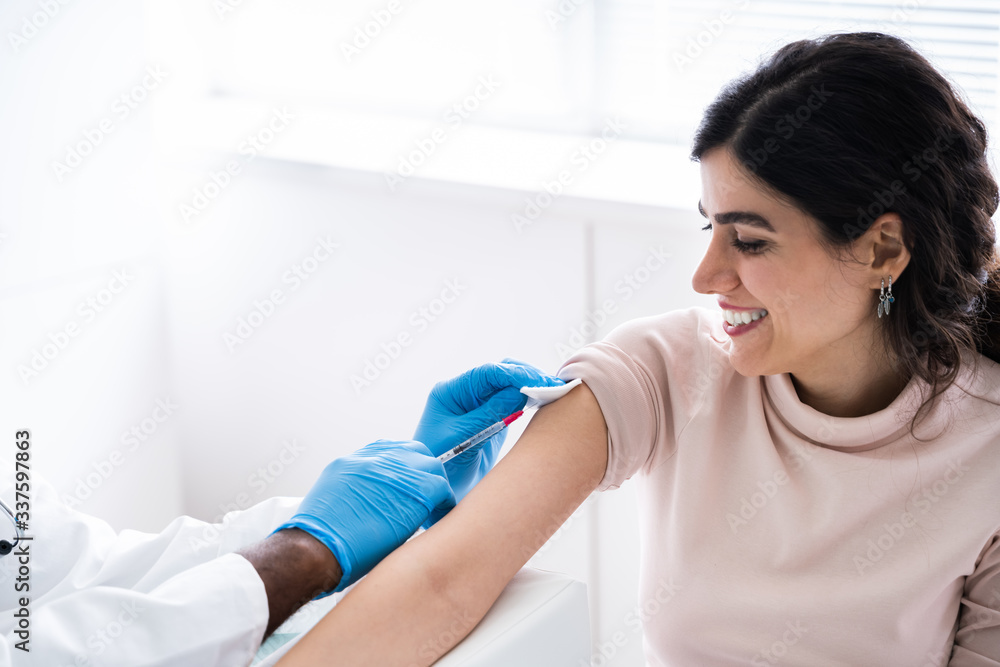 Doctor Injecting Patient With Coronavirus Vaccine Doctor Injecting Patient With Coronavirus Vaccine