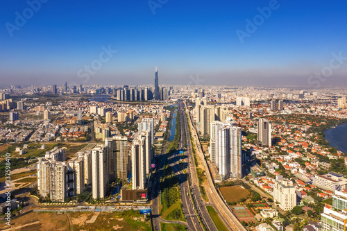 Top view aerial of Ha Noi highway and Cat Lai crossroads, Ho Chi Minh City with development buildings, transportation, infrastructure, Vietnam. View from Cat Lai crossroads to 1 district 