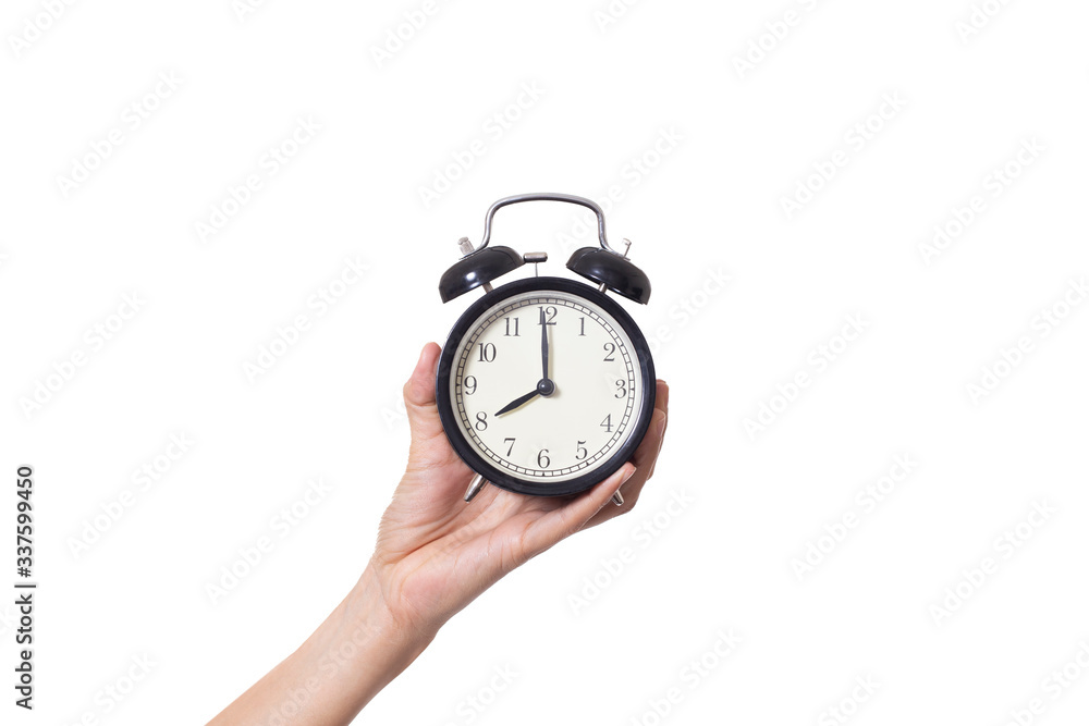 hand holding alarm clock isolated on white background hand holding alarm clock isolated on white background