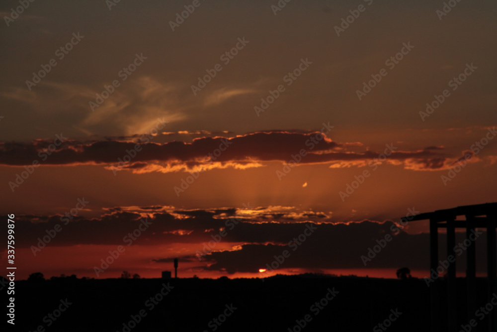 sunset over the airport with silhouette - zoom sunset over the airport with silhouette - zoom