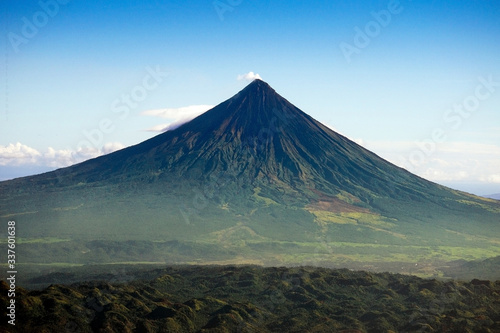 Aerial of Mt. Mayon - also known as Mayon Volcano or Mount Mayon. Found in the Bicol Region in the Philippines. Taken near Legazpi Airport. photo