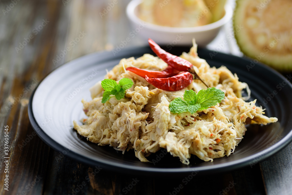 Northern Thai food (Tam Khanun), spicy pounded young jackfruit salad Northern Thai food (Tam Khanun), spicy pounded young jackfruit salad