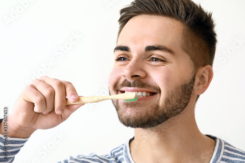 Happy smiling young man wit...