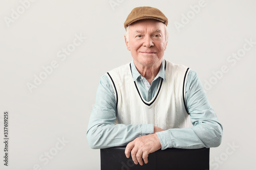 Portrait of elderly man on ...