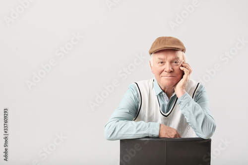 Portrait of elderly man on ...