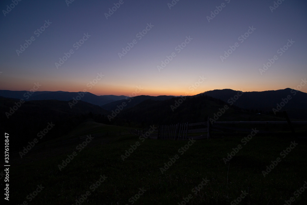 Silhouette of mountains and sky at sunset. Carpathians