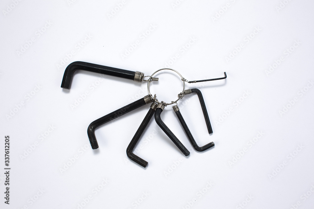 A family of black L-shaped hexagon wrench ( Upper view, selective focus, abstract ) A family of black L-shaped hexagon wrench ( Upper view, selective focus, abstract )