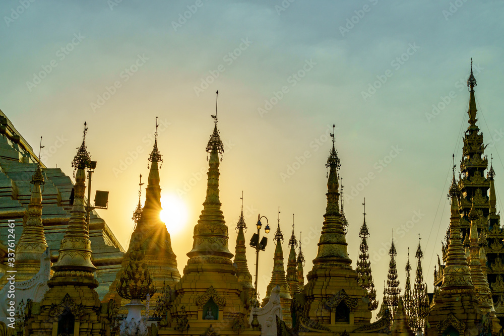 Shwedagon pagoda at sunset. This place is popular destination landmark in Yangon, Myanmar