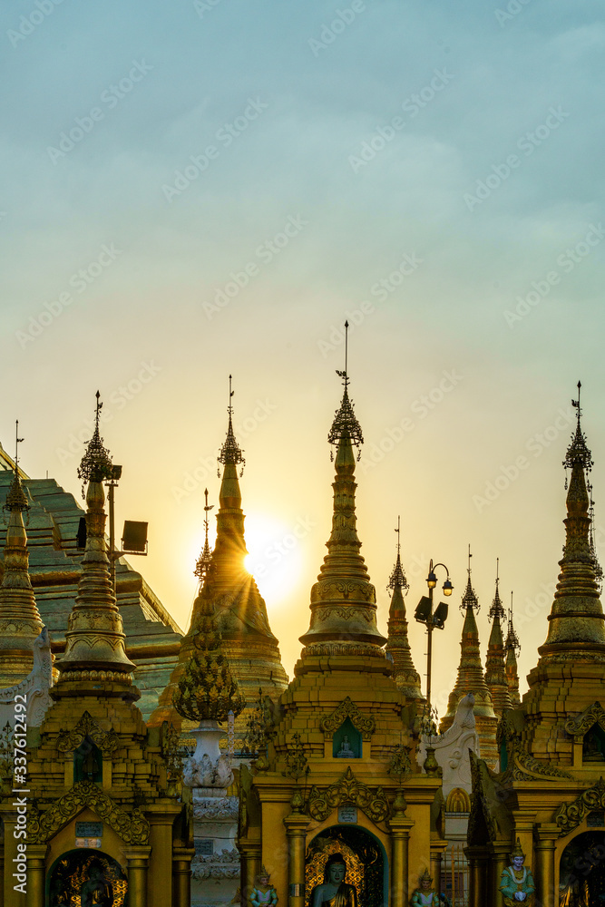 Fototapeta premium Shwedagon pagoda at sunset. This place is popular destination landmark in Yangon, Myanmar