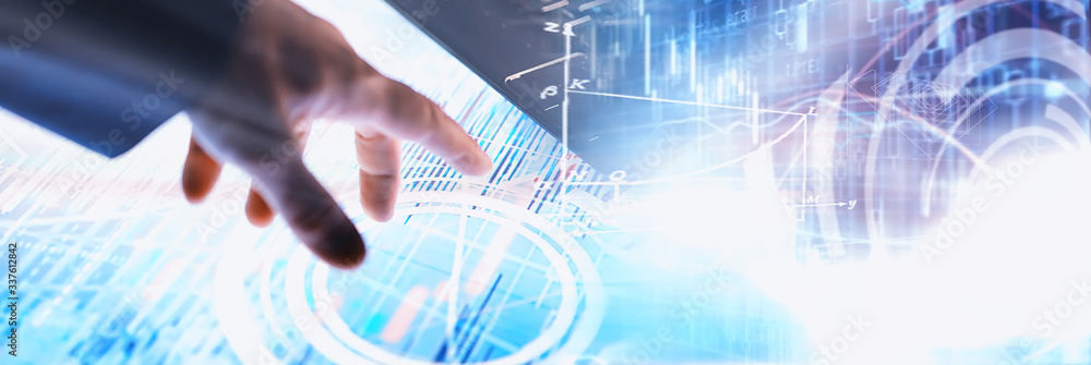 Business concept. Information technology and data processing. Hands over the screen with graphic data. A modern software product in business. Business concept. Information technology and data processing. Hands over the screen with graphic data. A modern software product in business.
