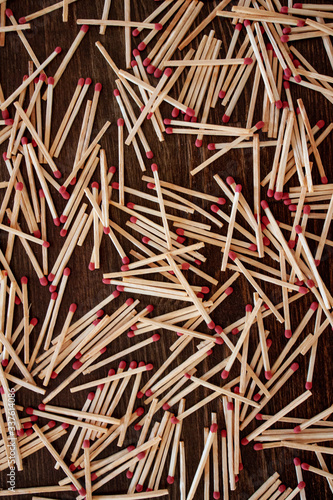 Spattered matches on a wooden table
