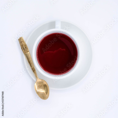 teapot and tea on white  background, over light