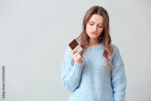 Displeased young woman with...