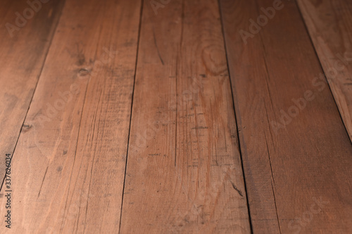 Brown scratched wooden board. Wood background. Old textured wood boards. 