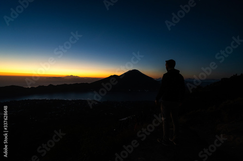 Aerial view of travel people with backpack on volcano Batur in the tropical island Bali. Royalty high quality free stock image of Danau Batur, Indonesia.