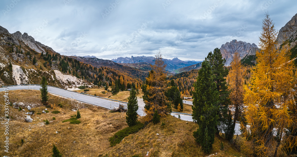 Obraz premium Overcast morning autumn alpine Dolomites mountain scene. Peaceful Valparola Path view, Belluno, Italy.