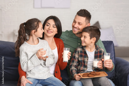 Family drinking milk with c...